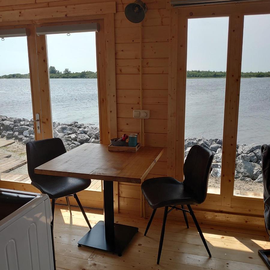 Waterhuisjes Op De Pier Van Lauwersmeerplezier! Lauwersoog Extérieur photo